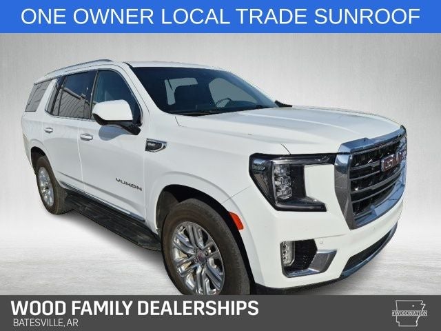 2023 GMC Yukon 4WD SLT in Summit White — front three-quarter view