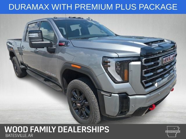 2025 GMC Sierra 2500HD 4WD Crew Cab Standard Bed AT4 in Sterling Metallic — front three-quarter view