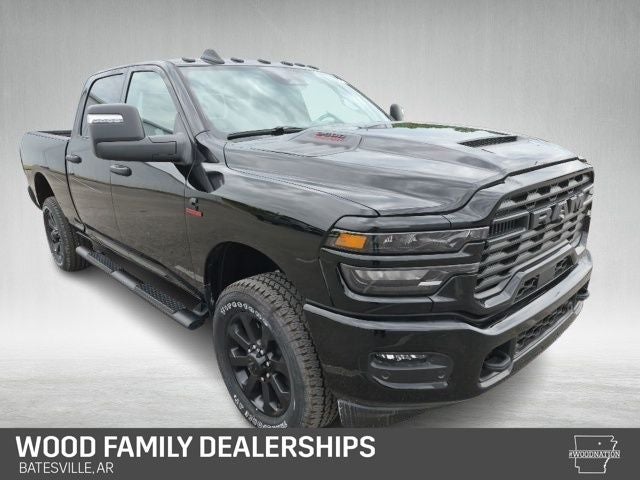 2026 RAM Ram 2500 RAM 2500 BLACK EXPRESS CREW CAB 4X4 6'4' BOX in Diamond Black Crystal Pearl-Coat Exterior Paint — front three-quarter view