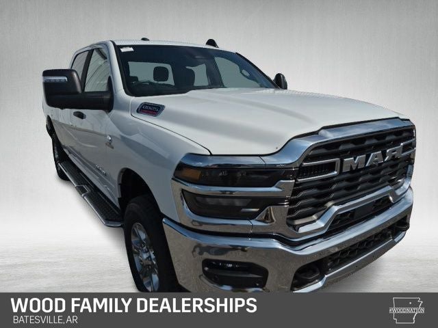 2026 RAM Ram 2500 RAM 2500 BIG HORN CREW CAB 4X4 6'4' BOX in Bright White Clear-Coat Exterior Paint — front three-quarter view