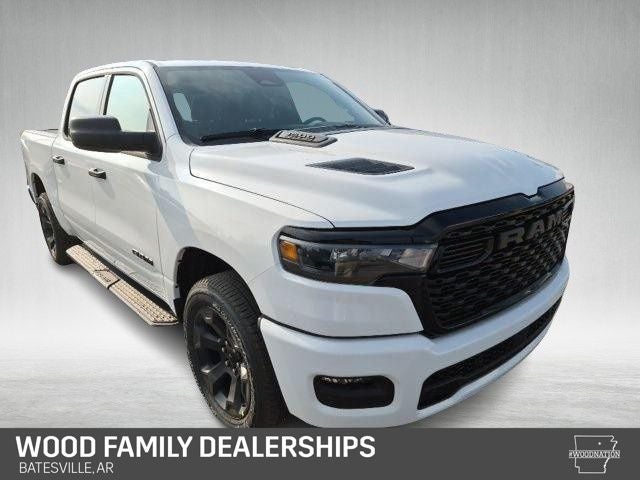 2026 RAM Ram 1500 RAM 1500 EXPRESS CREW CAB 4X4 5'7' BOX in Bright White Clear-Coat Exterior Paint — front three-quarter view